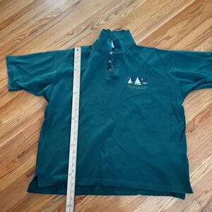 Dark green polo shirt
